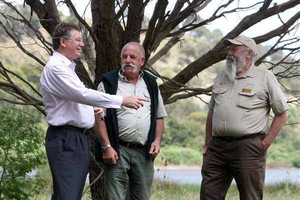 South West Coast MP Denis Napthine chats with new ranger Peter Coverdale (centre) and John Sutherland from Friends of Tower Hill.