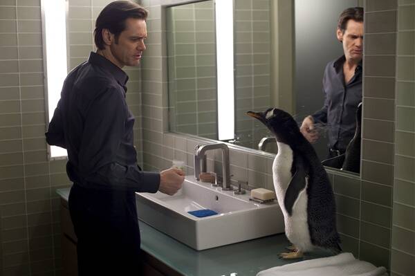 Jim Carrey as Tom Popper, with co-starring penguin.