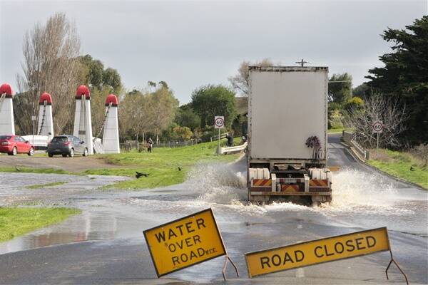 Not all vehicles heeded the warning signs as floodwater from the Merri River spilled across Wollaston Road in north Warrnambool.