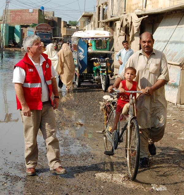 Australian Red Cross water and sanitation specialist Bob Handby in flood affected Nowshera, Pakistan. Picture: Fairfax