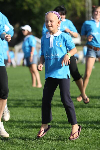 Relay for Life at Camperdown's Mt. Leura oval.Molly Hedricks - 7, of Camperdown, pictured jumping up during a group dance to music in the middle of oval.100320GW11 GLEN WATSON