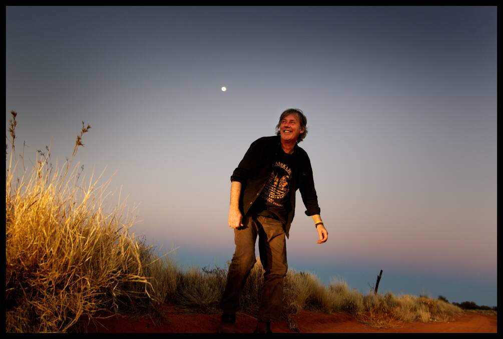 Shane Howard at sunset on his way to the outback Aboriginal community of Ernabella, where he performed celebrating the anniversary of Solid Rock.