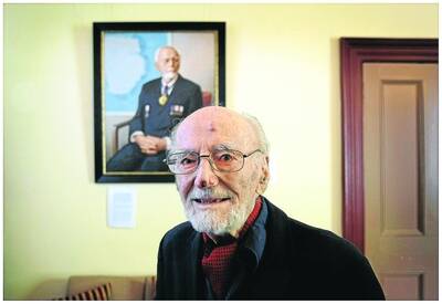 Antarctic pioneer Dr Phillip Law, with a painting of himself by Russian artist Vladimir Sobolev at The Royal Society. Dr Law, who died on Sunday, has been described as one of the Antarctic's true pioneers. Picture: THE AGE