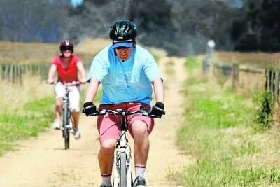 Warrnambool's Susan and Chris Baudinette enjoy riding the rail trail.
