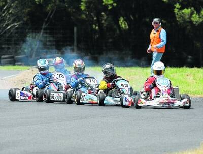 Eventual winner Anton de Pasquale from Geelong (No. 86) leads the field in a junior clubman class race on Saturday.