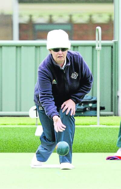 Port Fairy Red's Jan Norton bowls during her side's defeat at the hands of City Memorial Gold.