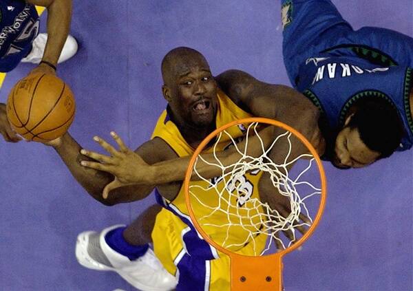 Shaquille O'Neal doing what he does best - not music.