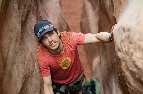 James Franco plays real-life adventurer Aron Ralston in the challenging  127 Hours .