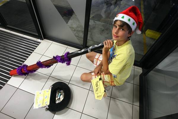 Instead of feeling sorry for himself, 10-year-old John Waterfield has turned to busking after six months of savings evaporated when his $260 scooter was stolen last weekend.