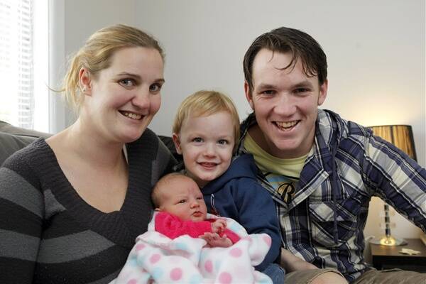 Simone Buckle, Angus, 2, and Will Buckle, with new baby Saige Violet. 120522RG06 Picture: ROB GUNSTONE