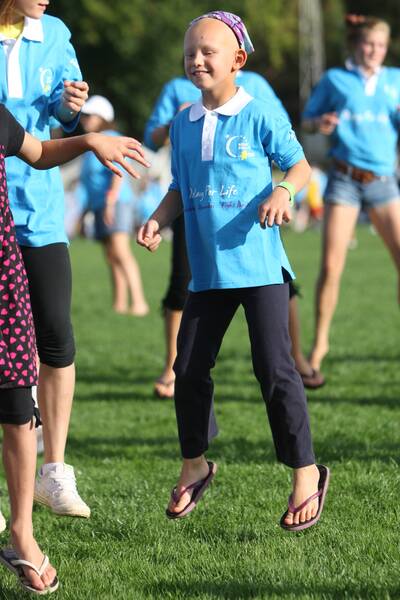 Relay for Life at Camperdown's Mt. Leura oval.Molly Hedricks - 7, of Camperdown, pictured jumping up during a group dance to music in the middle of oval.100320GW10 GLEN WATSON