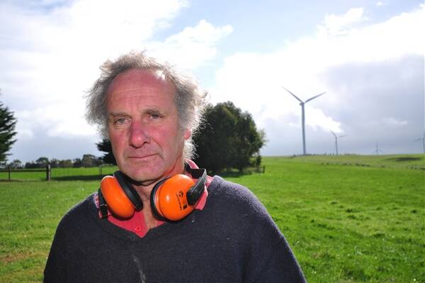 Wool producer Adrian Lyon lives near a wind turbine.