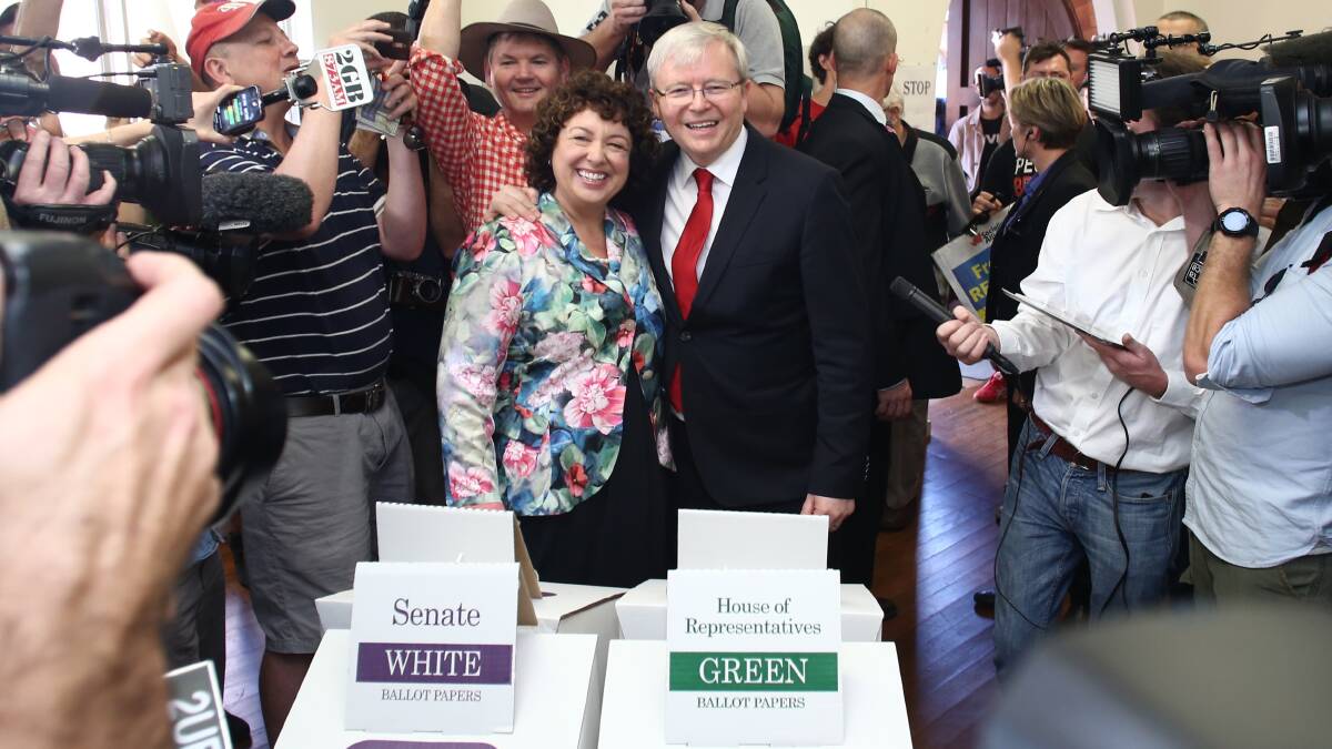 Prime Minister Kevin Rudd casts his vote alongside wife Therese Rein. Click or swipe across to see more photos from the 2013 election campaign trail. 