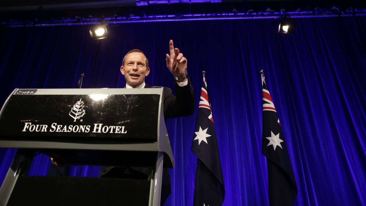 Prime Minister-elect Tony Abbott accepts victory at Sydney's Four Seasons Hotel. Photo: ALEX ELLINGHAUSEN