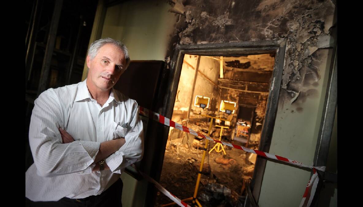 Telstra Country Wide south-west area manager Bill Mundy at the damaged exchange. Photo: DAMIAN WHITE