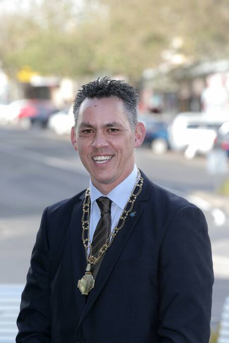 Warrnambool City councillor Michael Neoh was re-elected mayor for a fourth term at a special council meeting last night. 