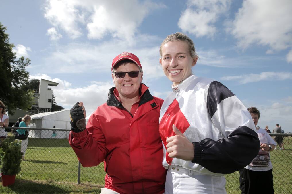Orford trainer Anne McGrath (left) and jockey Lily Coombe celebrate after Six Beat took out the Penshurst Cup yesterday.