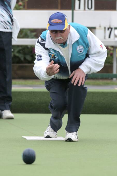 Port Fairy Red’s Alan Parker concentrates on his bowl during his team’s round 12 WDBD match against City Memorial Gold on Saturday. 