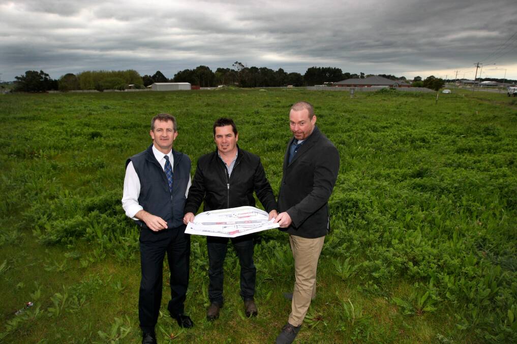 Developer Les Speed (left), building designer Mark Bourke and Extreme Life pastor Paul Collinson on the north-east corner of Wangoom Road and Hopkins Highway, where a new childcare centre and church are to be built. 