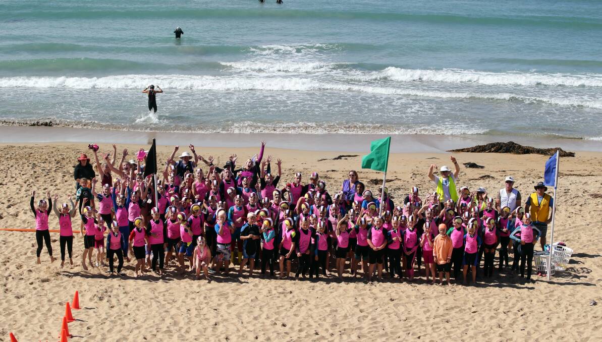 Warrnambool nippers assemble on the beach before their western country region championships next week. 
