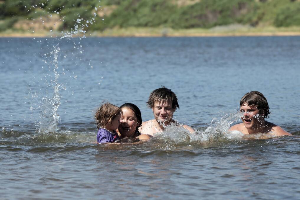 Warrnambool’s blowhole provided some sweet relief for (from left) Shakaya Grose, 2, Aysha Grose, 9, Sean Hutchinson and Shannon Grose, all of Warrnambool, as the temperature topped 42 degrees in January.