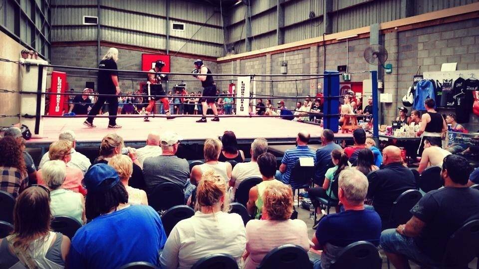 The crowd watches Sunday’s boxing exhibition at Koroit.