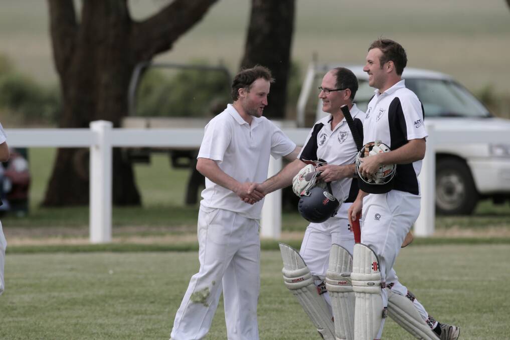 Teammate Luke Bushell (left) congratulates the batsmen who steered Grassmere to victory, Peter Sedgley and Isaac Malone. 