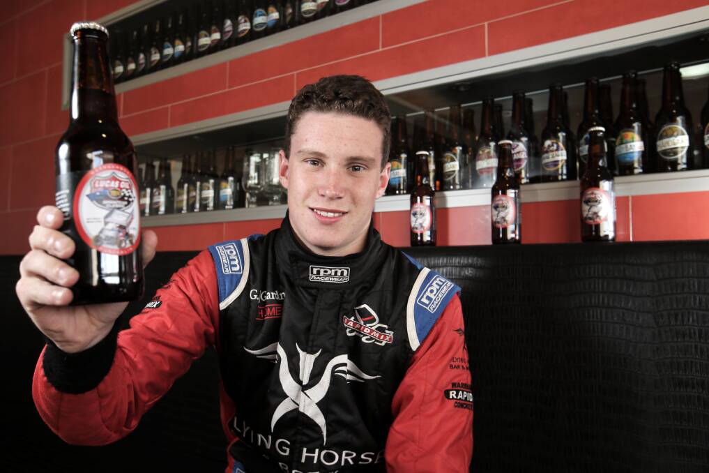 Driver Will Carroll says cheers to the Flying Horse Bar and Brewery’s Classic Pale Ale. 
