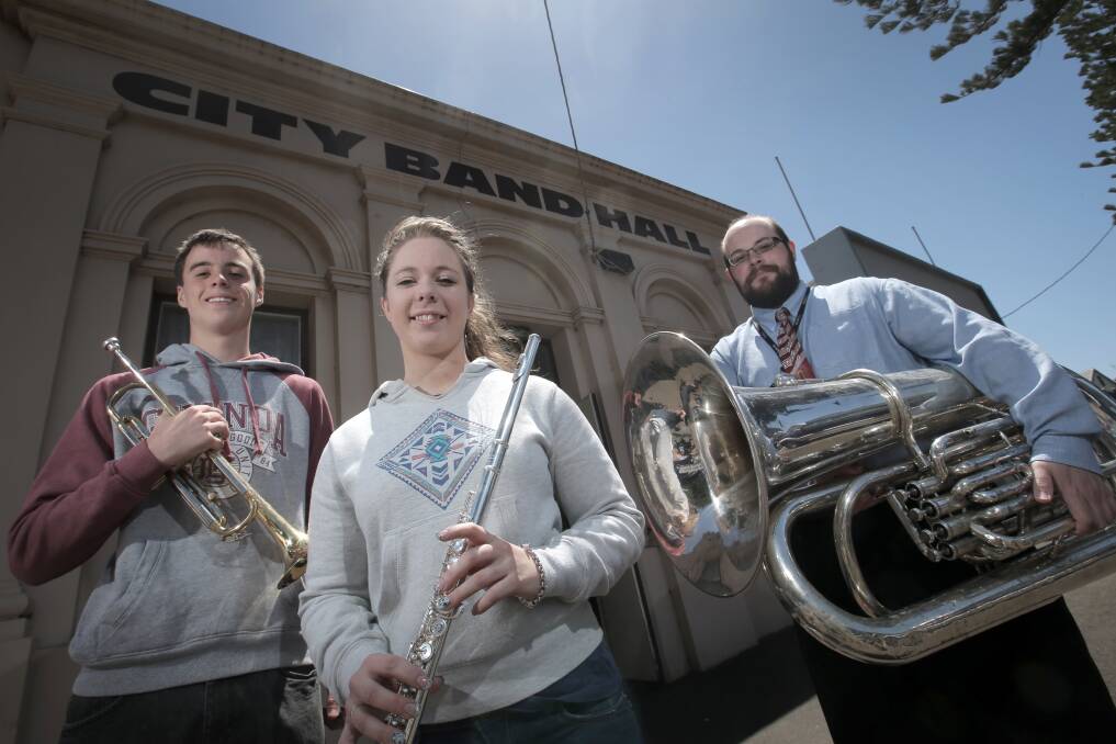 Warrnambool City Band members Anthony Bartlett (trumpet), Bethany Gillie (flute) and Paul Howlett (tuba and trombone) need new members to ensure their band’s future. 