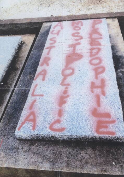 The Warrnambool grave of Catholic priest John Day, who died in 1978, has been defaced with the spray-painted words ‘‘Australia’s most prolific paedophile’’.
