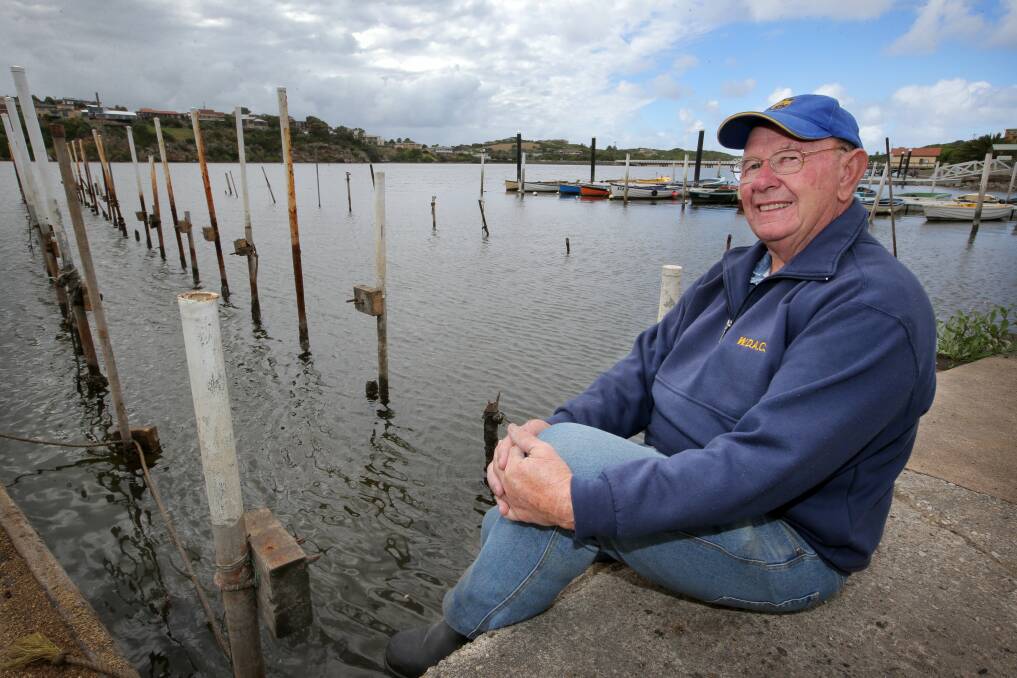 Norm Sheppard, from Warrnambool Angling Club, surveys work on the new floating jetty under construction on the Hopkins River. 