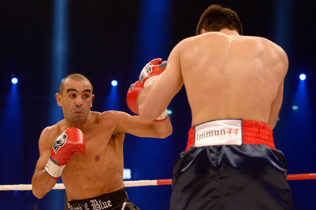 Sam Soliman on the attack against Felix Sturm in the IBF middleweight final elimination fight in Germany in February. 