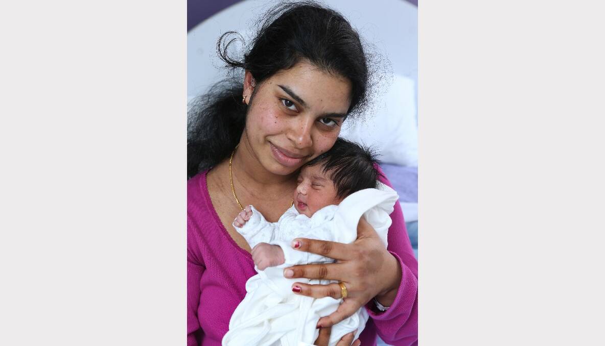 Mother Johncy Vezhambathottathil with her baby Isabel Shinoy, born July 22, 2013 at Bendigo Health. Picture: Peter Weaving