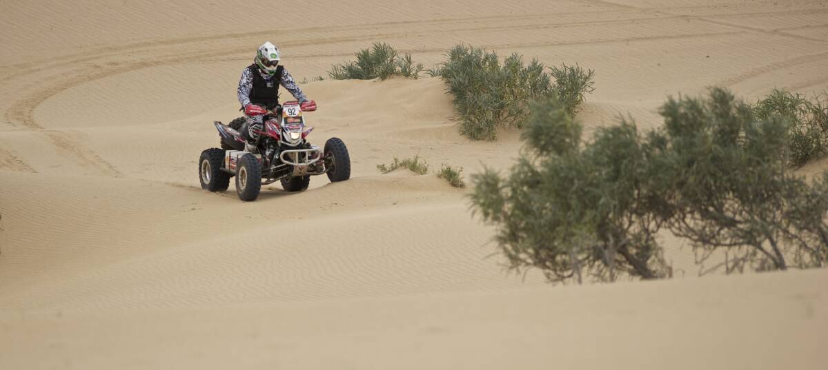 Mepunga quad-bike rider Paul Smith battles sand dunes during the Australasian Safari. Picture: Keith Hedgeland