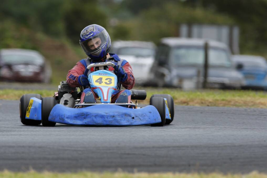 Kyle Rethus, of South Purrumbete, corners hard on the way to winning the clubman light race. 