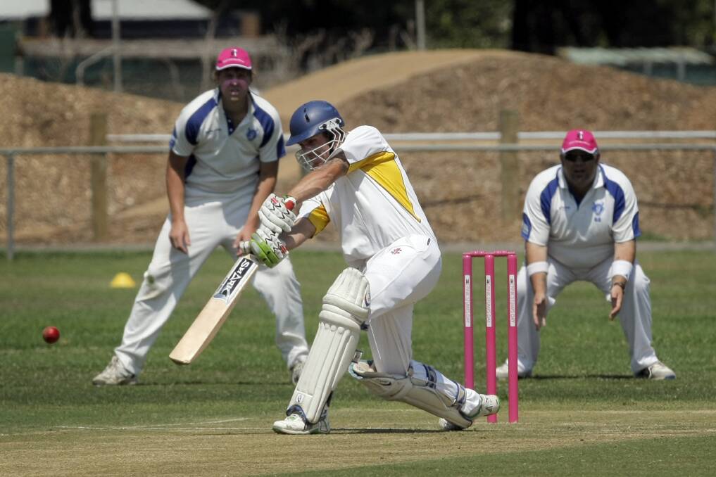 Merrivale batsman Justin Lynch plays off the front foot on his way to his maiden century, with Russells Creek slips Bill Quinlivan (left) and Paul Walker unable to stop the runs.