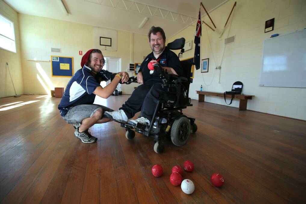 Warrnambool boccia player Danny Byrne, 35, with brother Keegan, 22, has his sights set on the 2016 Paralympics in Rio de Janeiro — provided he can raise the funds. 