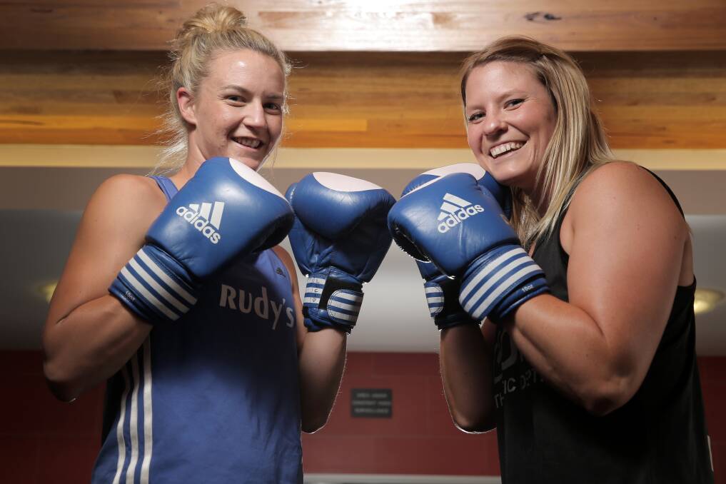 Local boxers Luci Hand (left) and Bianca Slater will join with other fighters for a fund-raising event, Box 4Bryn, to be staged in Warrnambool next month. 