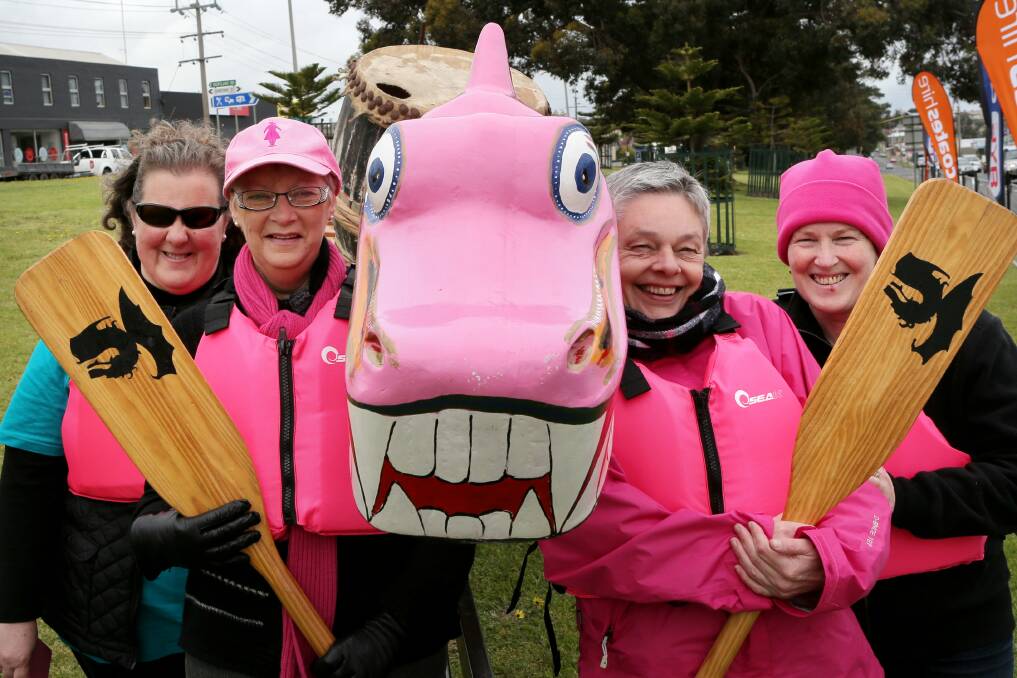 Marlene O’Brien (left), Judy Conn, Sue Glaisher and Lorna Tan with the breast cancer dragon boat.  
