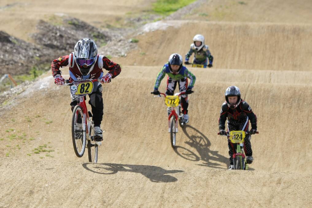 James McKinnon (left) has earnt state team selection for winning performances like this one in a schools event. James, 8, will compete at the national BMX titles in Shepparton next year. 