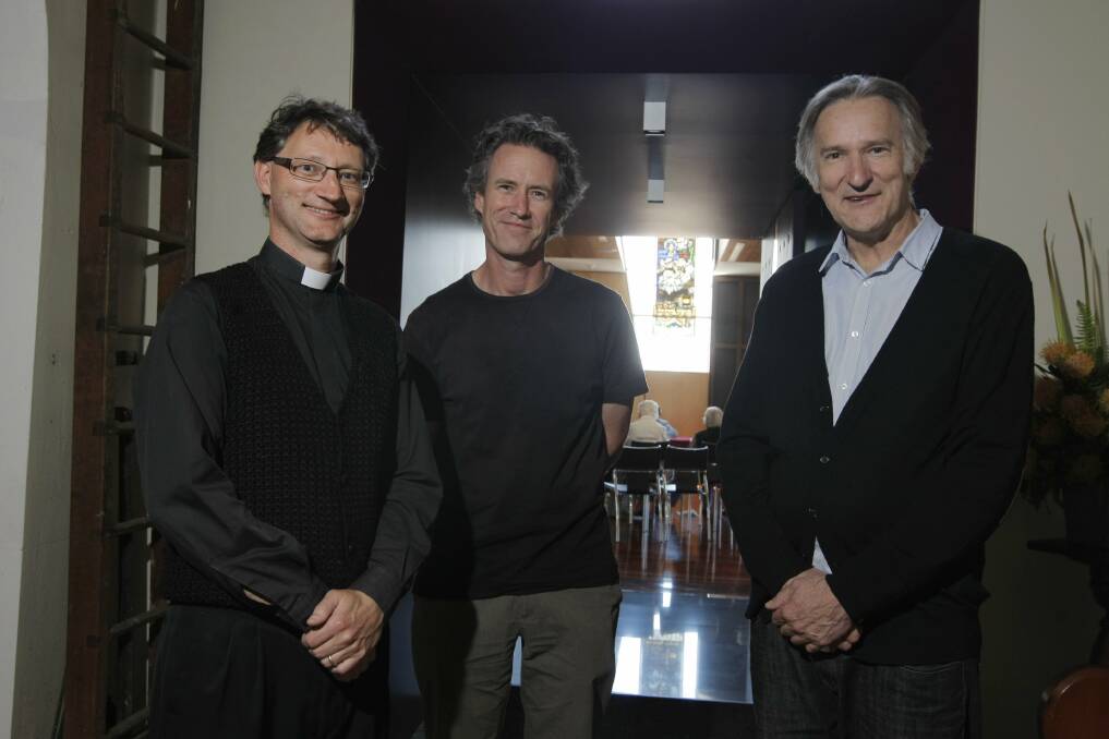 Anglican parish rector Father Scott Lowrey (left), project architect Ken Seakins and Harmer Architecture director Philip Harmer in the building link between Christ Church and the award-winning Hammond Fellowship Centre.