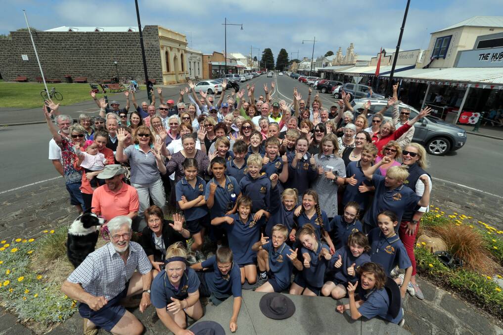 Port Fairy residents celebrate the village’s big win yesterday as the world’s most liveable town with a population under 20,000.  