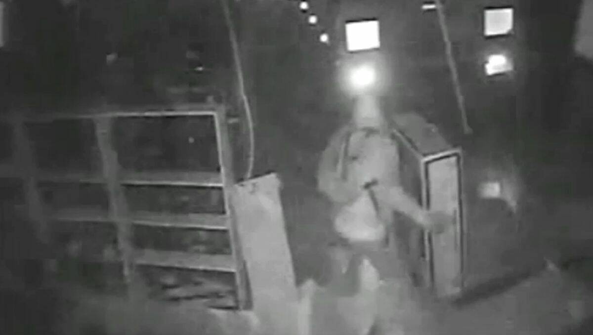 A still image from CCTV footage of the ram raid in which a $400 train set was stolen. PICTURE: THE COURIER