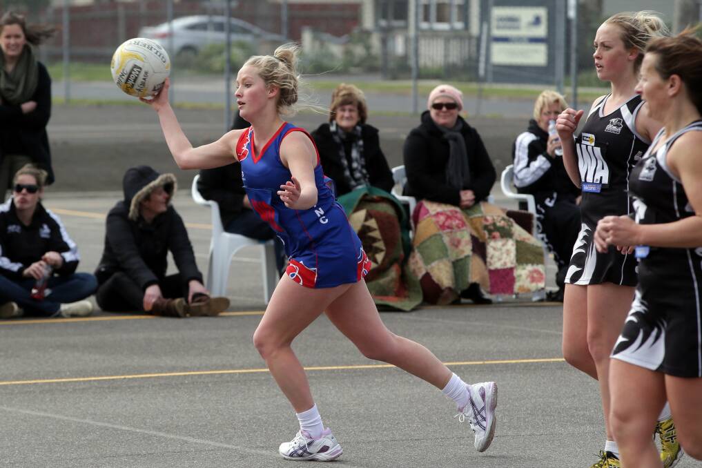 Terang Mortlake's Lisa Couch gets a shot away during the Bloods' loss against Camperdown. 