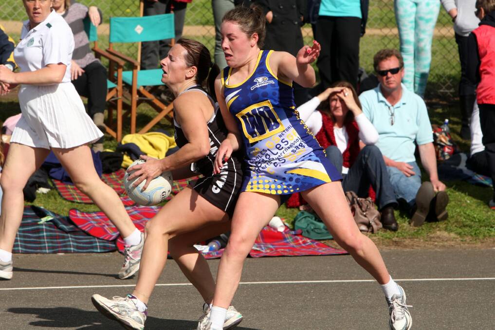 amperdown's Tracey Baker and North Warrnambool Eagles Grace Chow. Pictures: DAVE LANGLEY