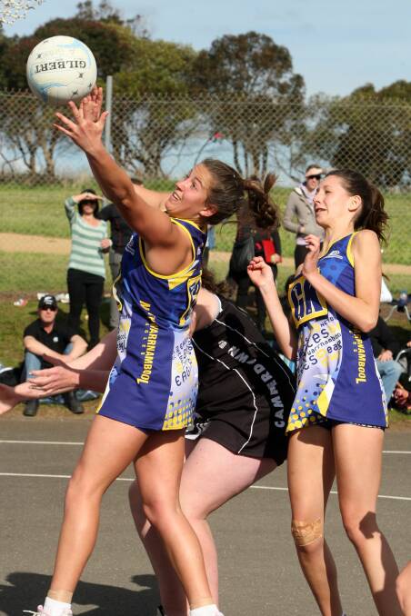 Jordyn Billings (left), Rachael Ryan in a contest with Camperdown's Narelle Welsh. Pictures: DAVE LANGLEY