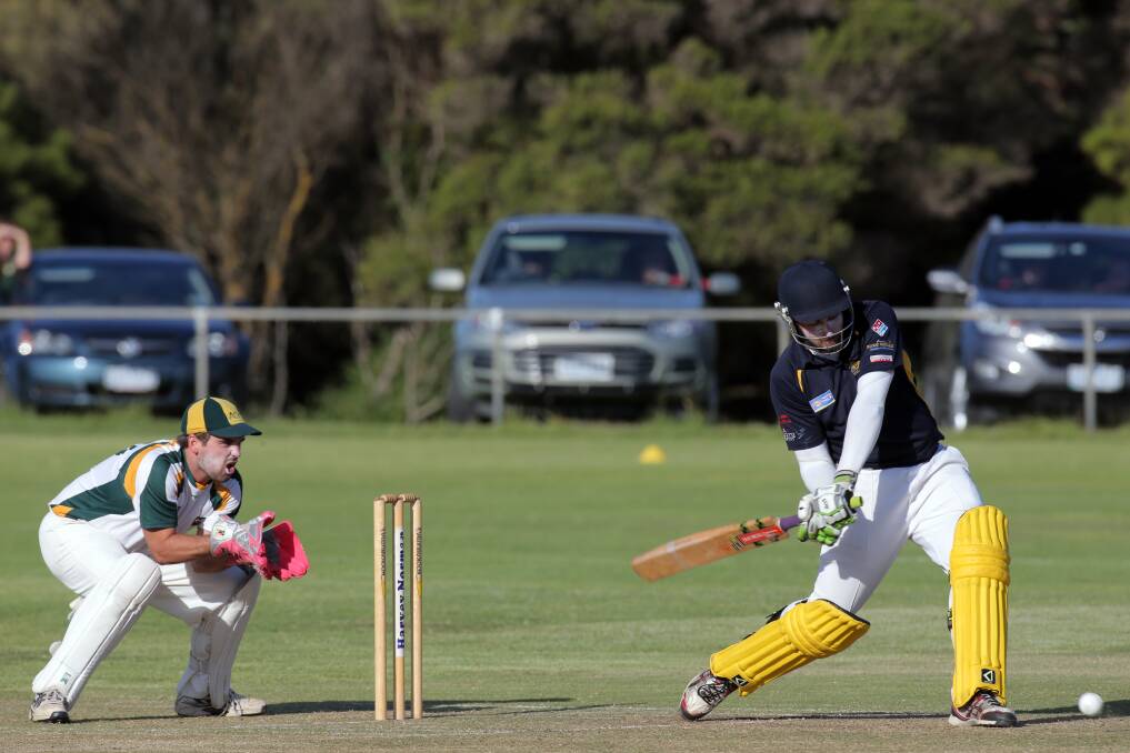 Woodford opening batsman Nick Butters launches into a drive during the Eels’ stunning run chase. Allansford wicketkeeper Rowan Ault banks on an error. 