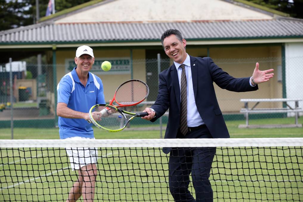 Warrnambool Indoor Tennis Centre manager Rob Urquhart (left) along with Warrnambool mayor Michael Neoh take to the court at Warrnambool Lawn Tennis Club to help promote the city’s bid in the Australian Open Blitz competition.