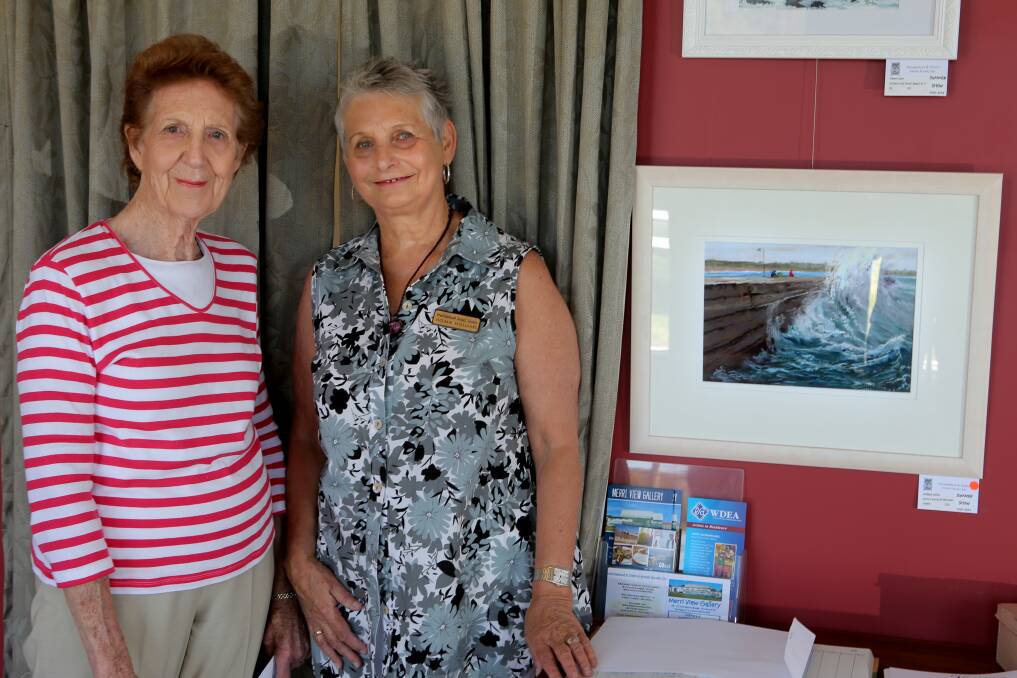 Wilma Williams (right) took out first prize in Warrnambool Artists’ Society’s summer show on Sunday. She is pictured with runner-up Fay Chenoweth at Merri View Gallery. 
