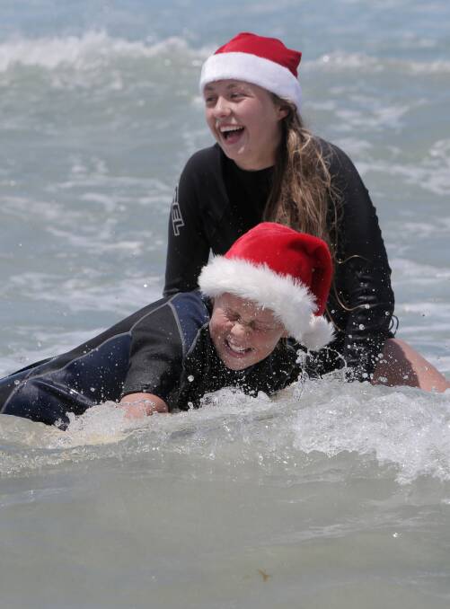 Surf fun: Elsa,13, and Greta Stromvall-O’Brien, 14.